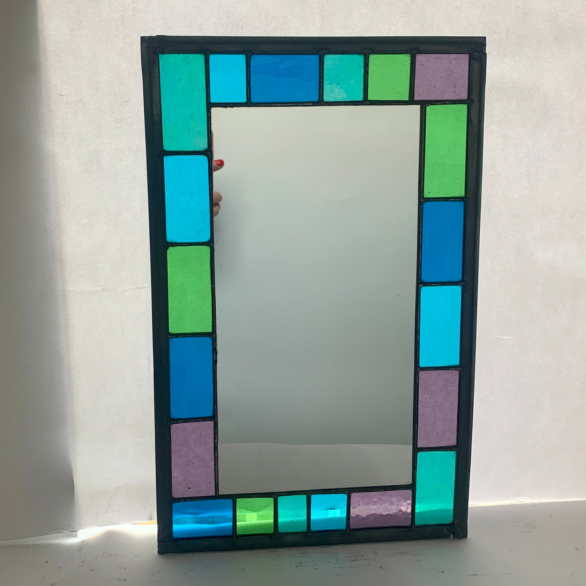 Stained Glass Mirror with randomly placed blue and green glass border. Stained Glass. Traditional Colour Glass. Blues, Aqua and Turquoise Glass.