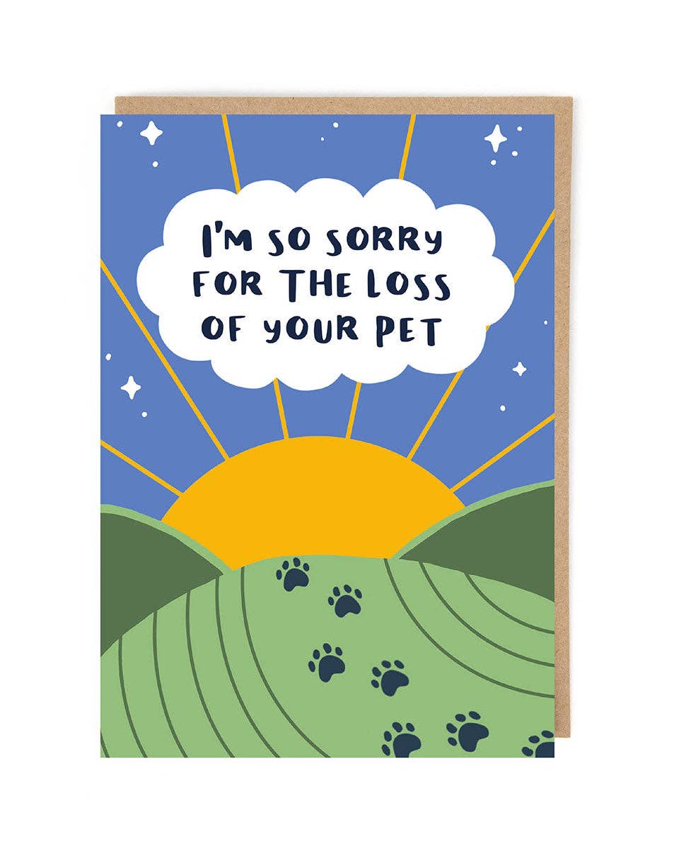 Greeting card with a blue sky, yellow sun, green landscape, and paw prints on a white background.