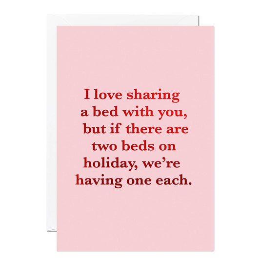 Pink card with red text on a white background