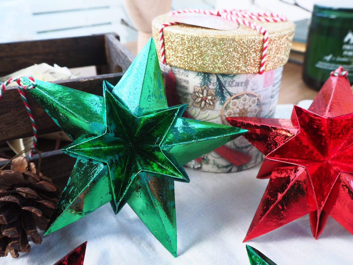 Origami Metallic Paper Star Decoration in red or green.