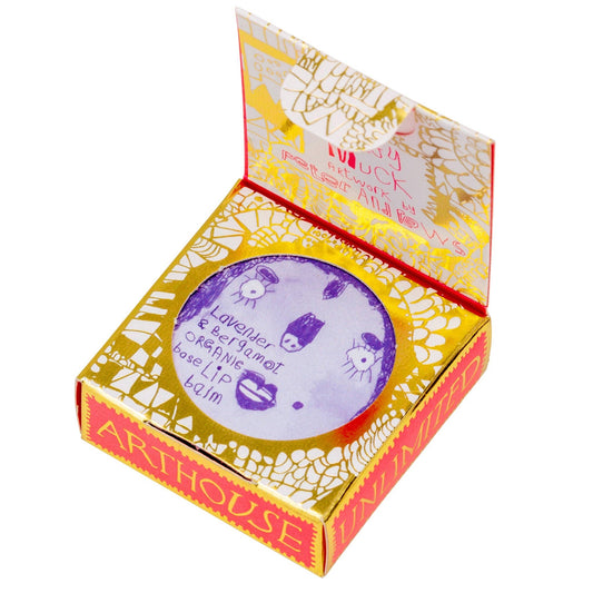 Open box of Arthouse lip balm with decorative design on a white background