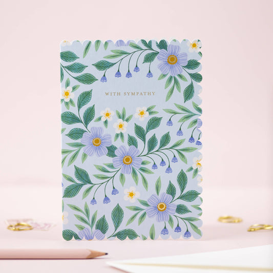 Floral notebook with 'With Sympathy' text on a light pink background
