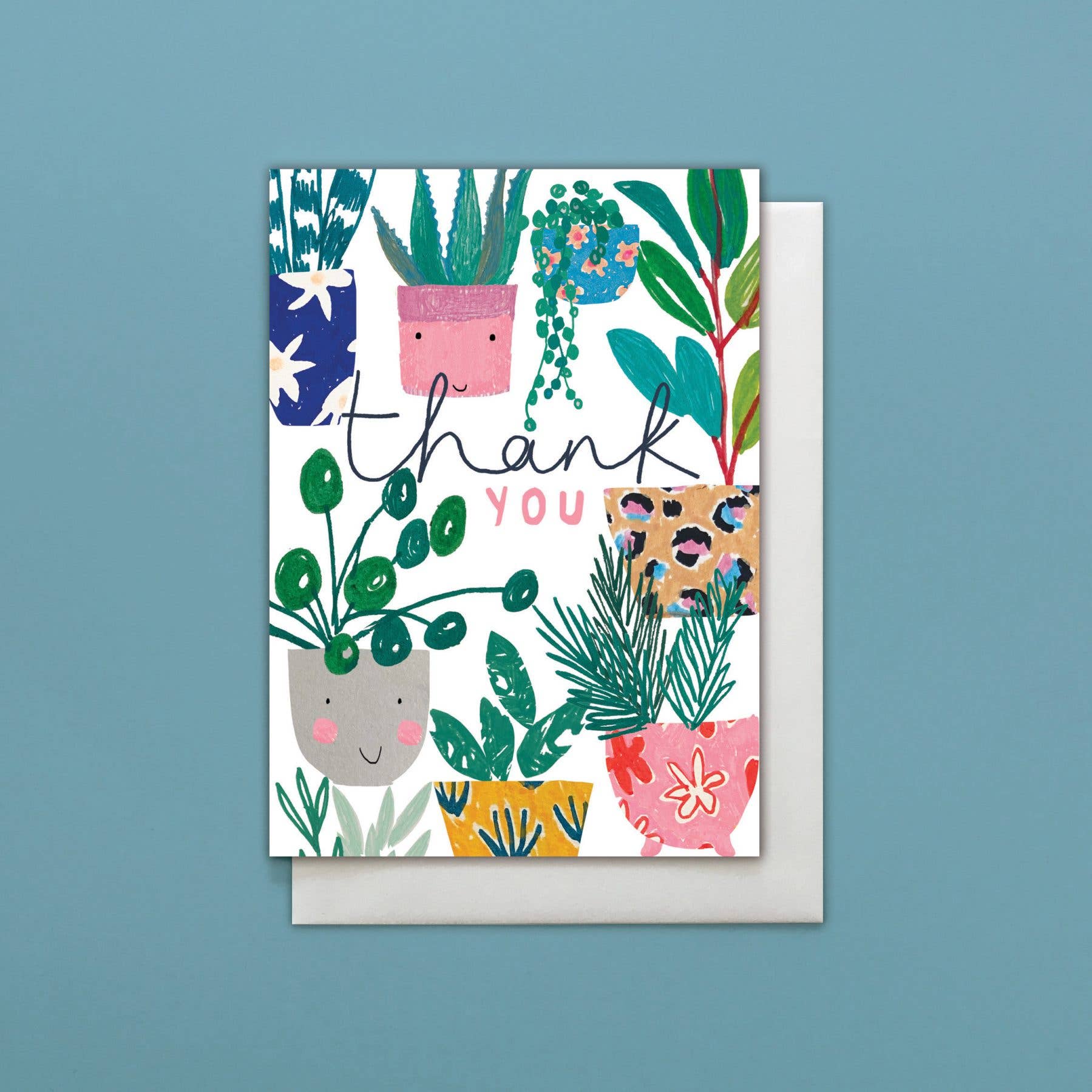 Greeting card with plant illustrations and 'thank you' text on a blue background