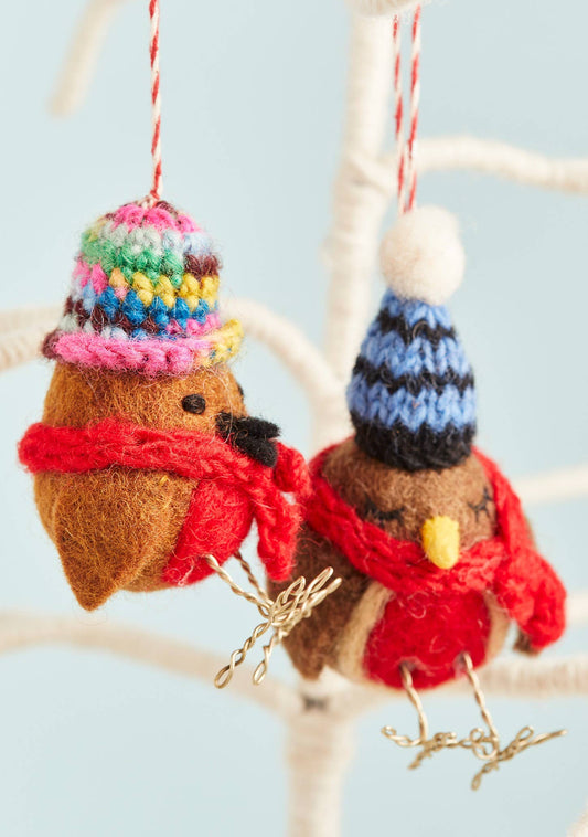 Felted robin with woolly hat and scarf.