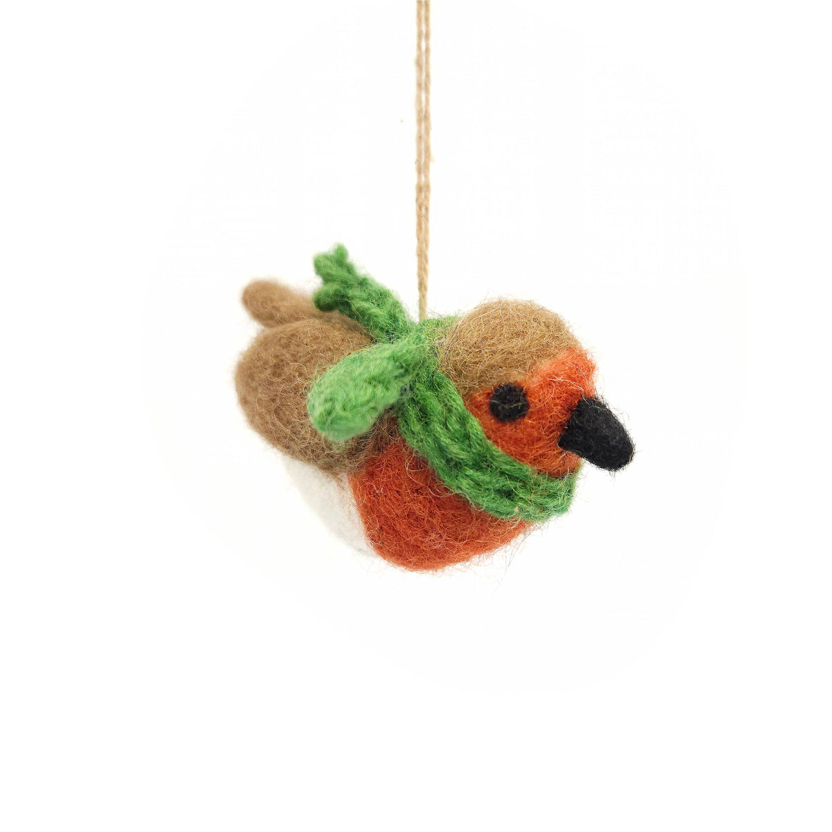 Felted wool bird ornament with green leaf on a white background
