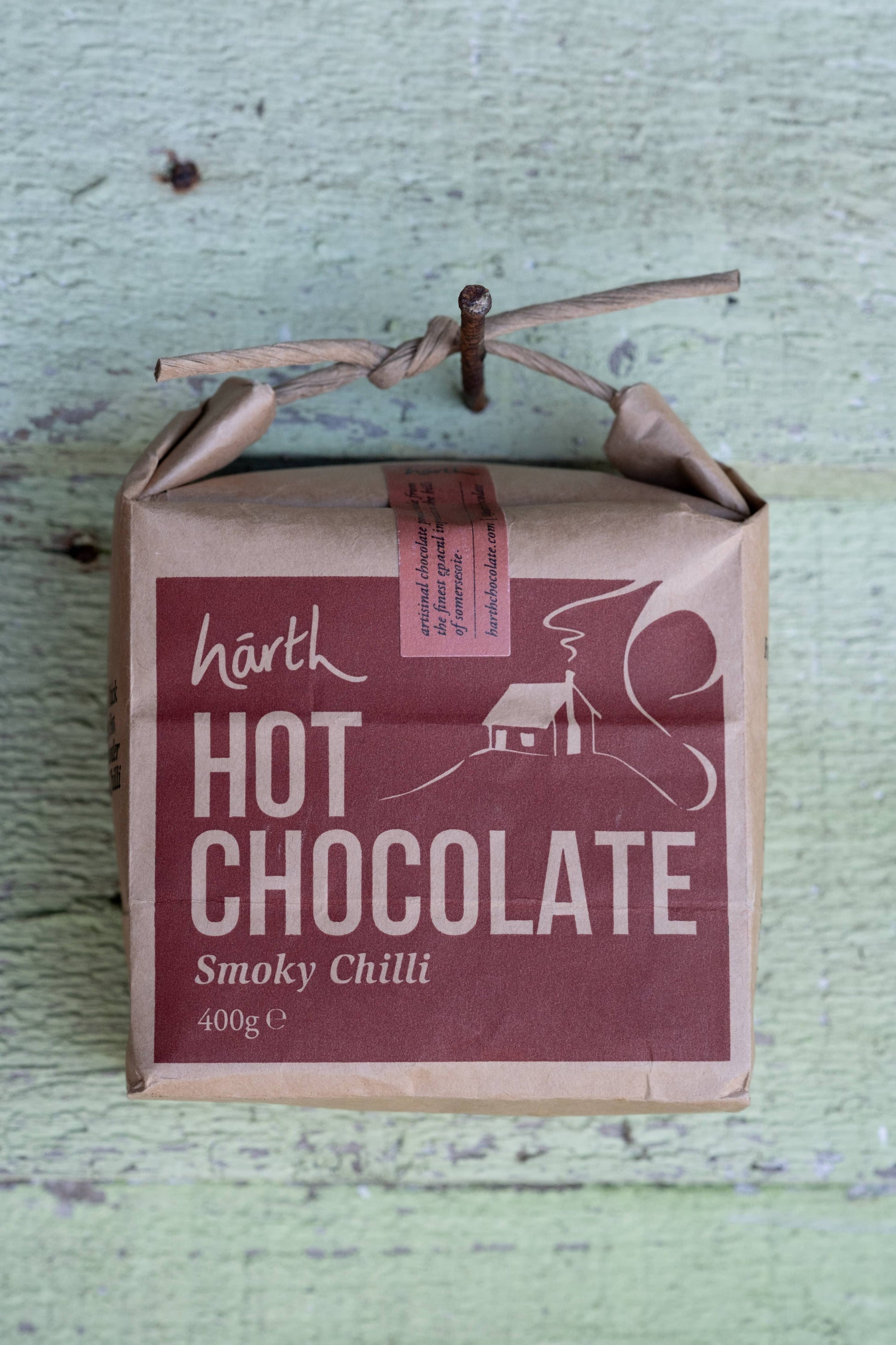 Box of Harth Hot Chocolate Smoky Chilli on a textured surface