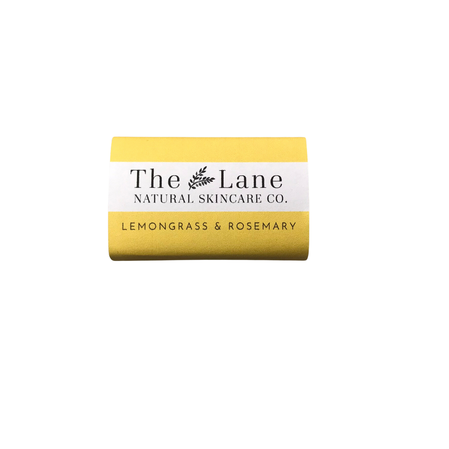 Yellow bar of soap with 'The Lane Natural Skincare Co.' label on a white background