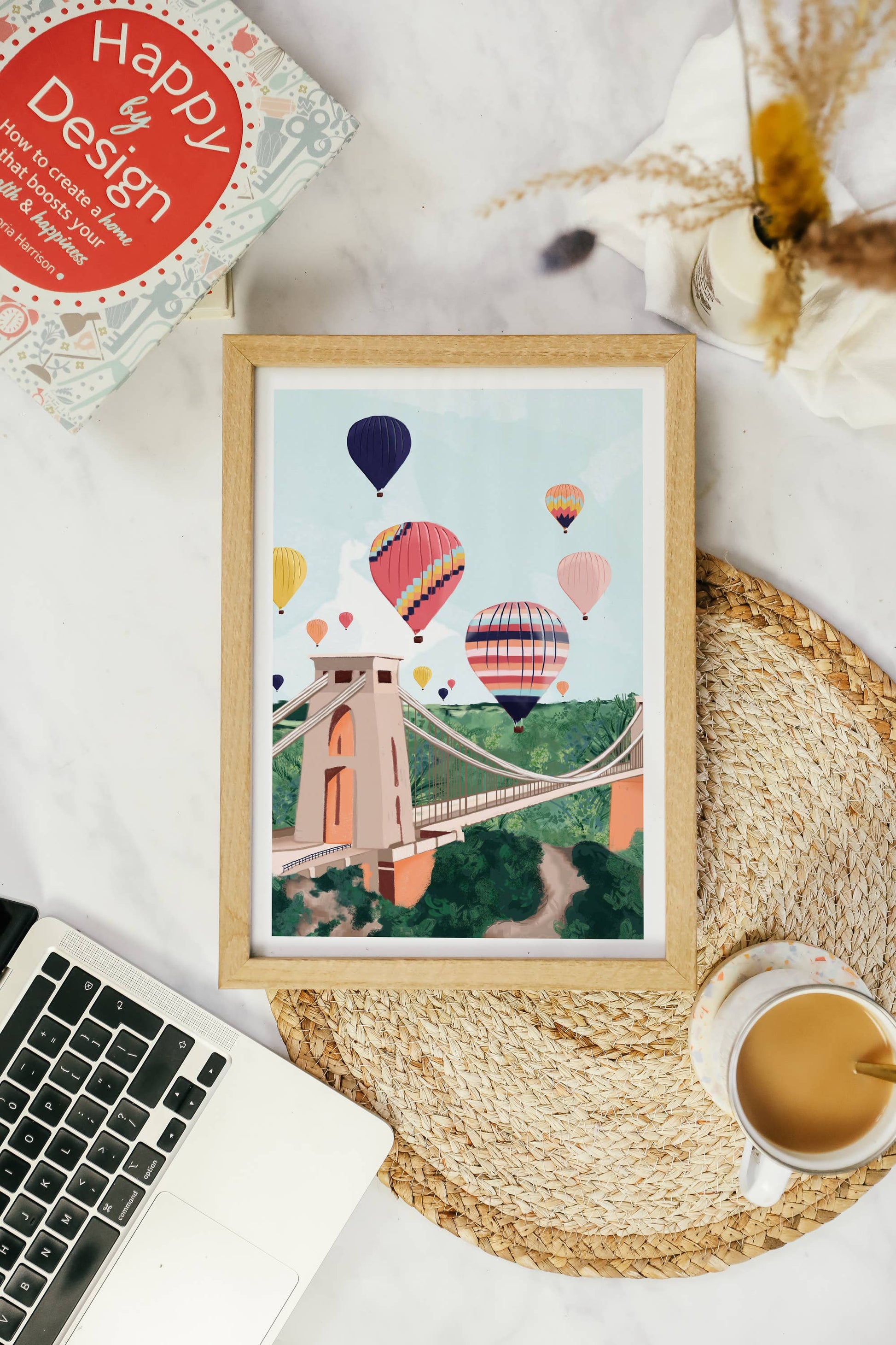 Colourful illustration of Clifton Suspension Bridge in Bristol with hot air balloons