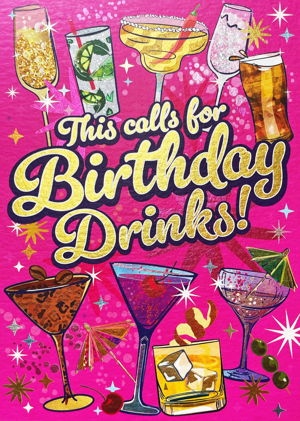 A hot pink card featuring various alcoholic drinks/cocktails with a script font in the centre reading "This calls for birthday drinks!".
