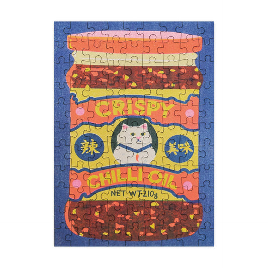 Puzzle with a design of a container labeled 'Sichuan Chili' featuring a cat illustration on a blue border.
