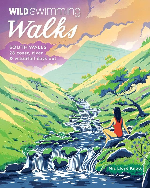 Illustrated cover for a walking guide titled 'Wild Swimming Walks: South Wales', showing a scenic landscape with a waterfall, green hills, mountains, and a person meditating by the water.