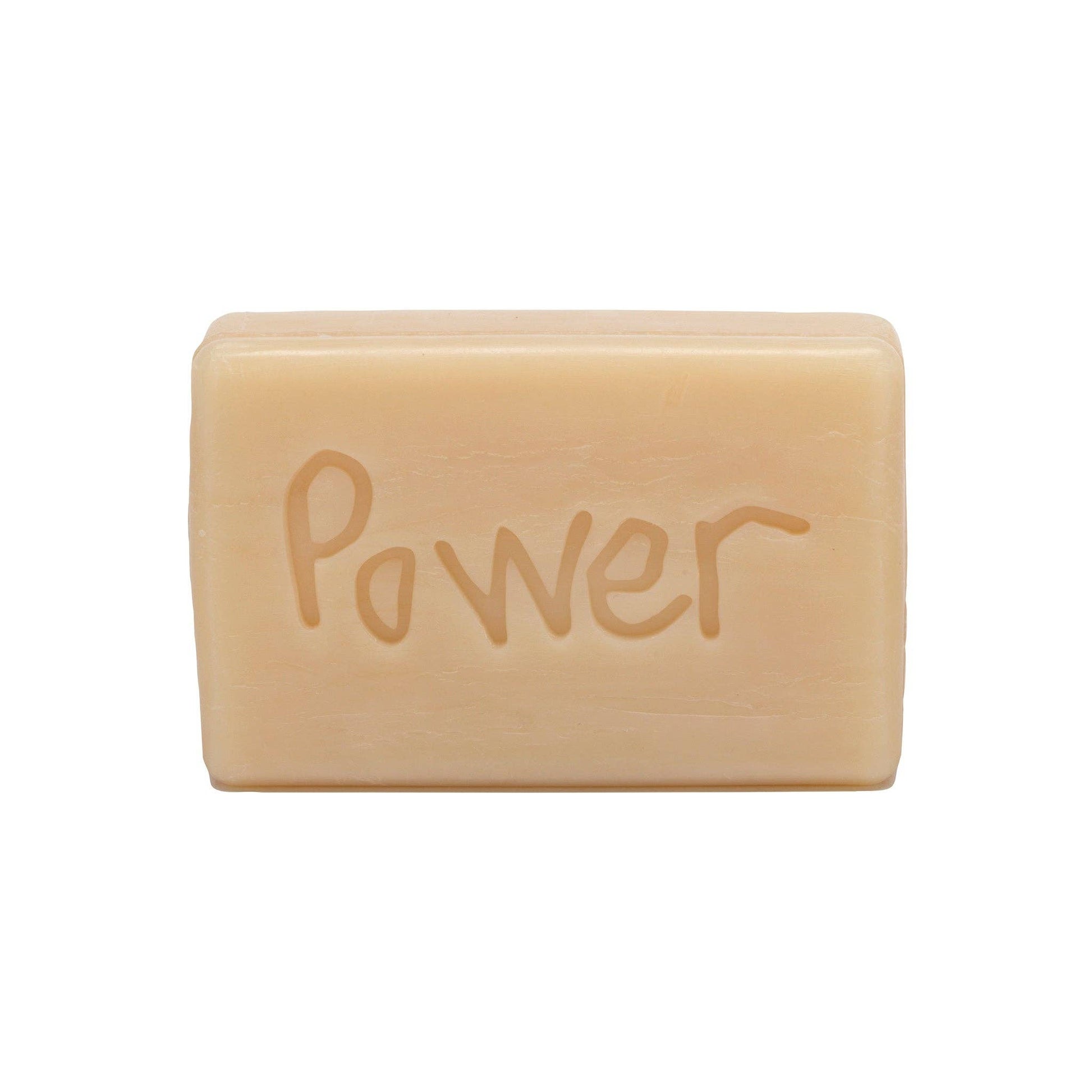Bar of soap with 'Power' engraved on a white background
