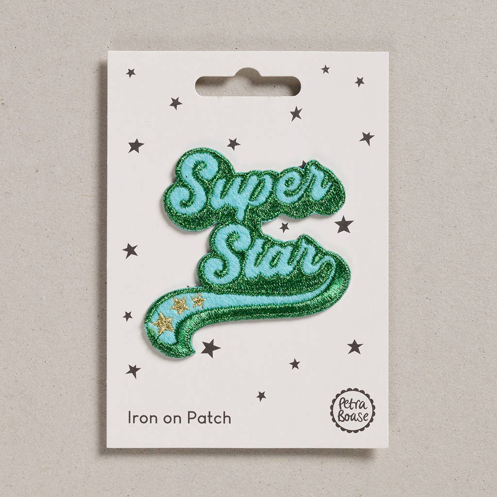 Iron on patch with 'Super Star' text on a white card with star decorations