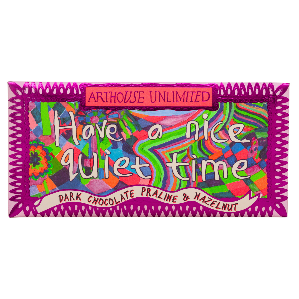 Chocolate bar packaging with colorful design and text, featuring Arthouse Unlimited brand.