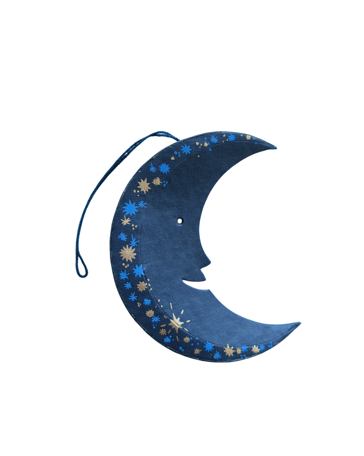 Blue crescent moon-shaped ornament with star patterns on a white background