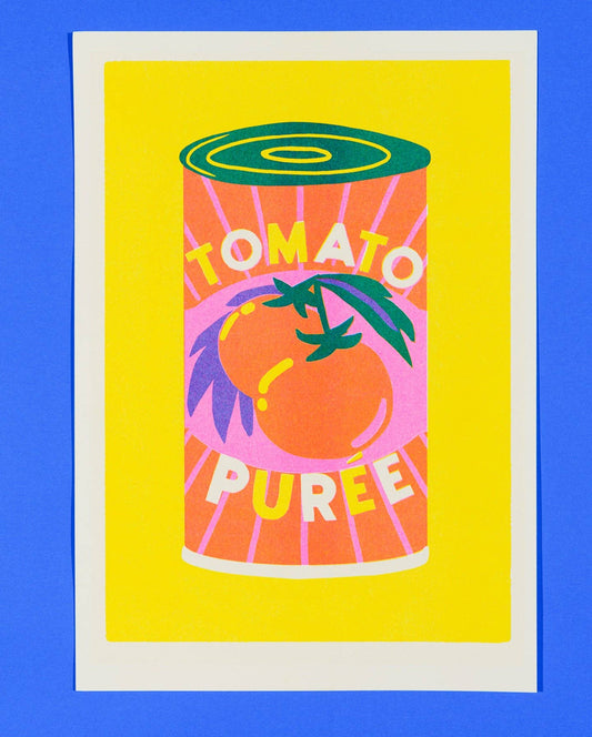 Illustration of a can labeled 'Tomato Puree' on a yellow background