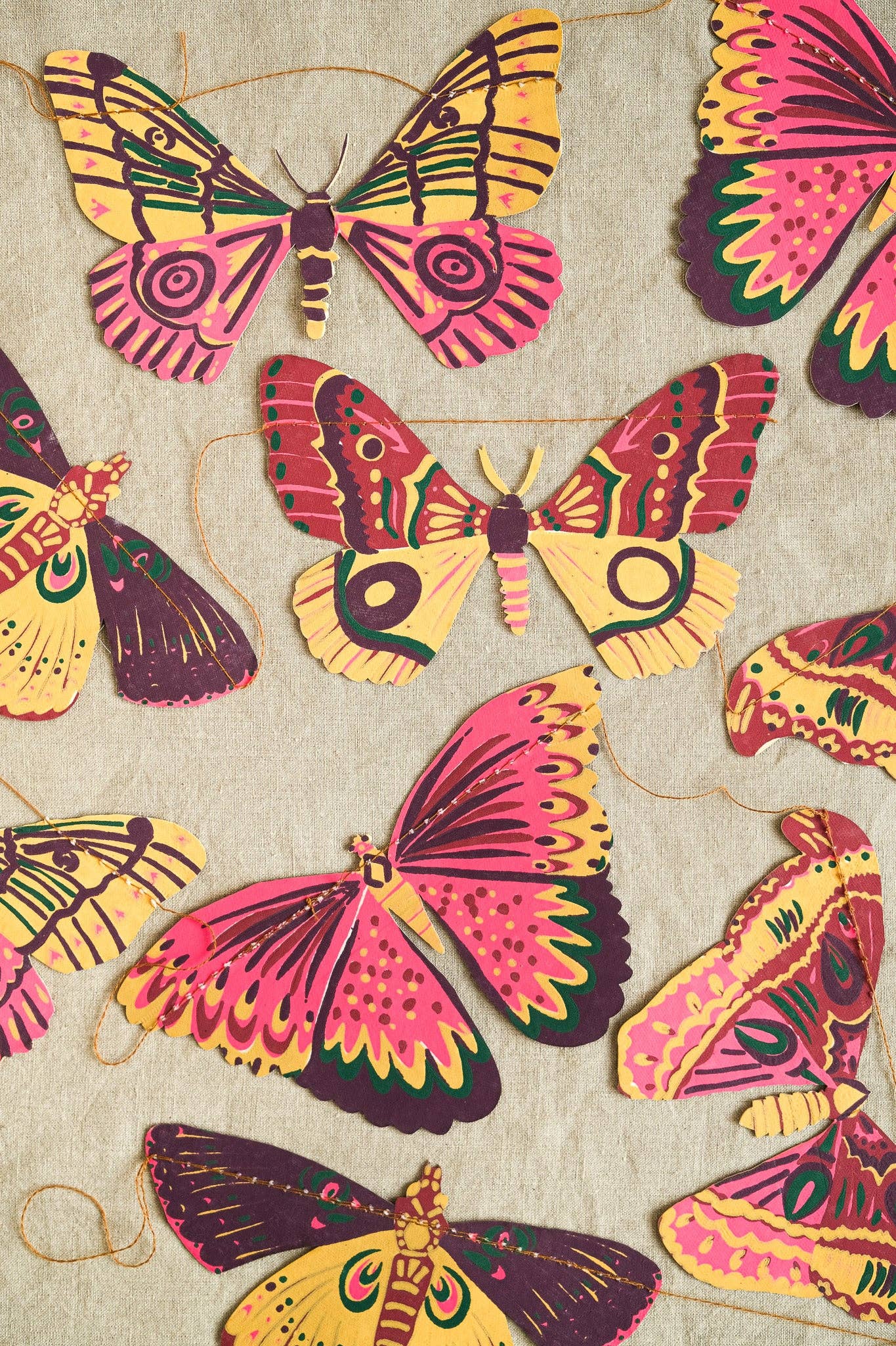 Colorful butterfly illustrations on a textured beige background