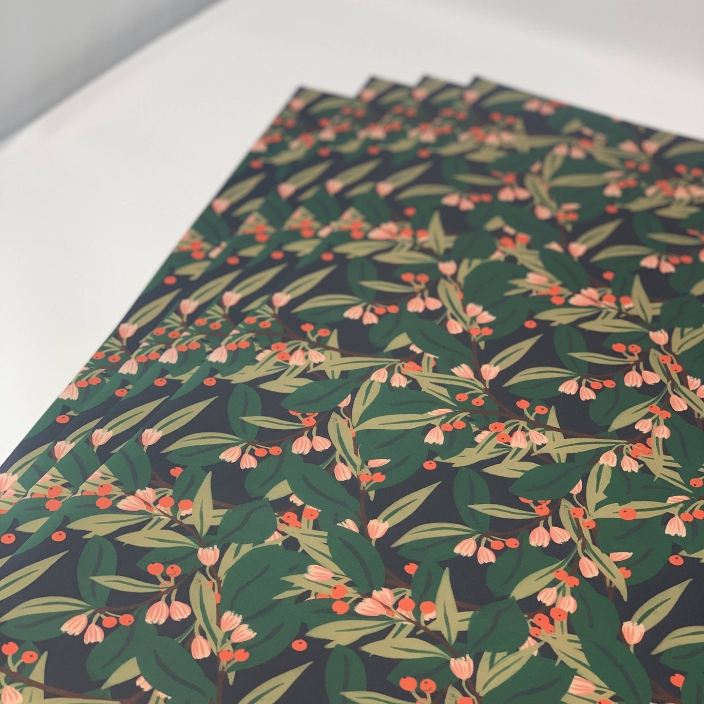 Christmas greenery deep green gift wrap. Winter flowers, suitable for winter birthdays.