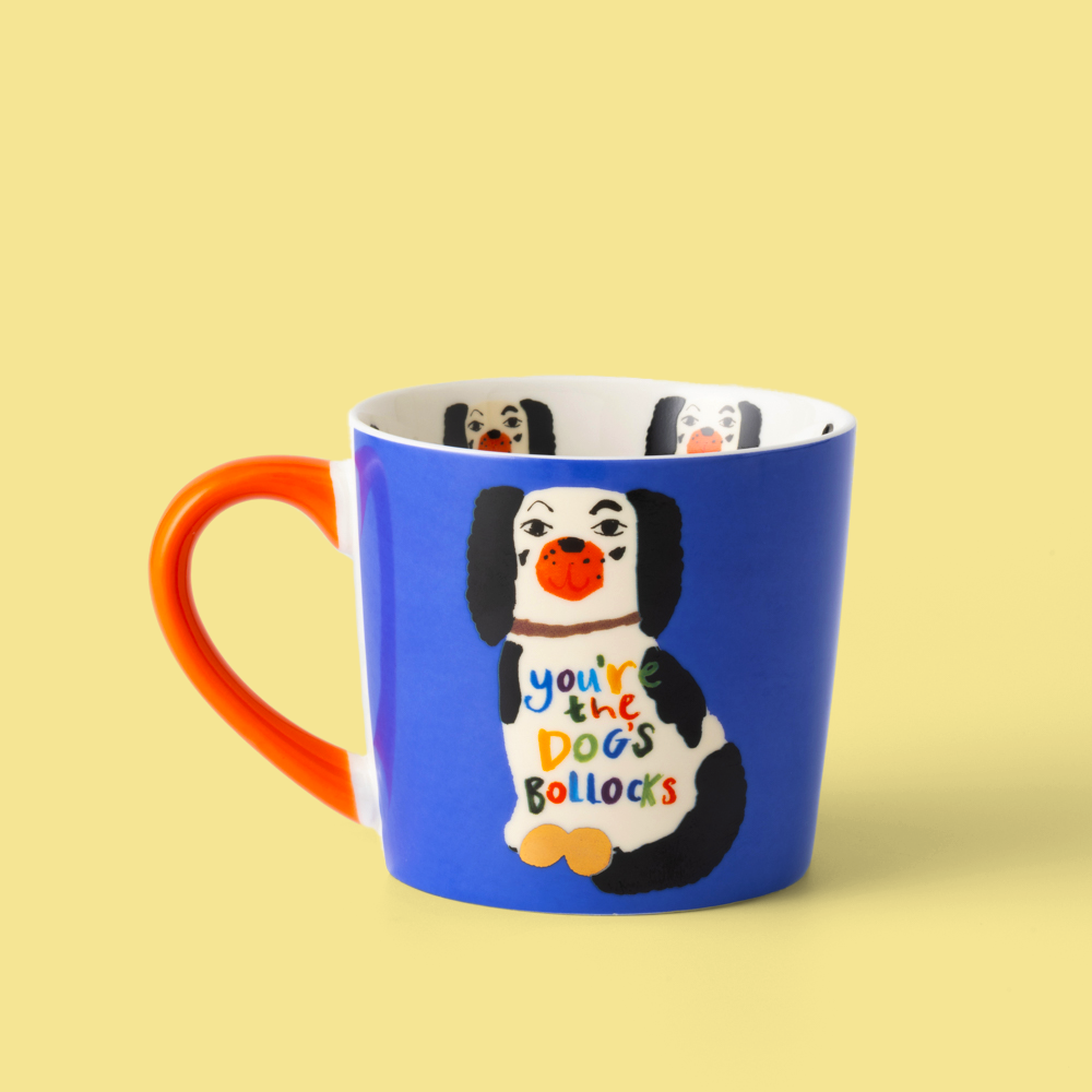 Blue mug with a dog illustration and text on a yellow background