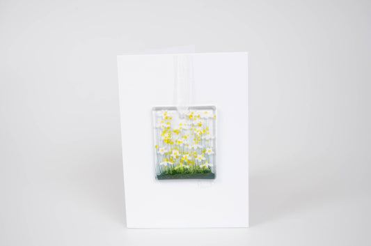 Glass panel with yellow flowers on a white background