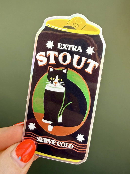 Sticker design resembling a beer bottle labeled 'Extra Stout' with a cat illustration on a green background.