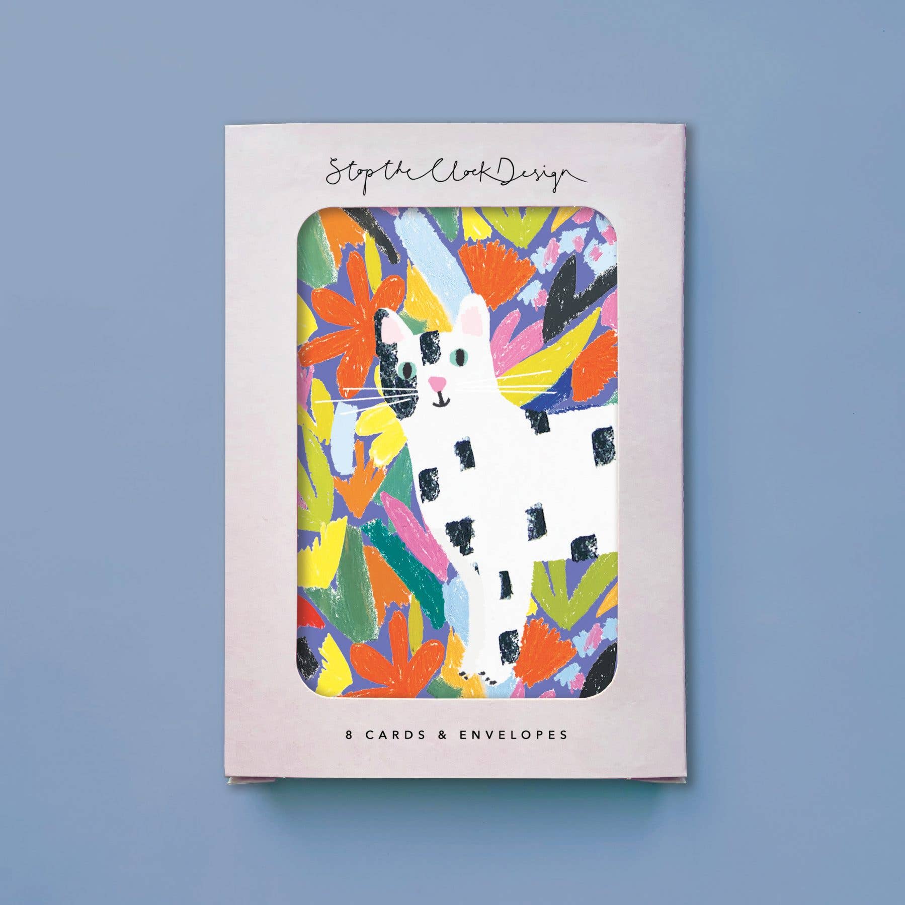 Card set with colorful cat design on a blue background