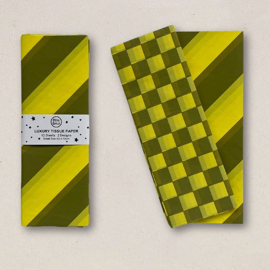Green and yellow patterned tissue paper with a visible brand label on a light gray background