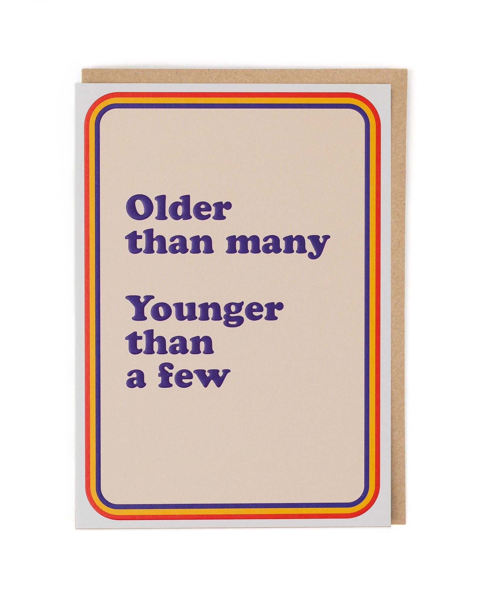 Greeting card with text 'Older than many, Younger than a few' on a beige background with a rainbow border.