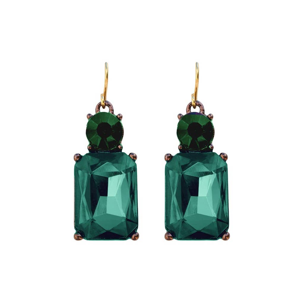 Green gemstone earrings on a white background