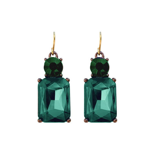Green gemstone earrings on a white background