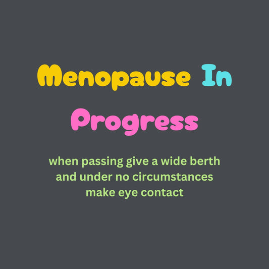 Text on a dark background with colorful text reading 'Menopause In Progress' and humorous instructions.