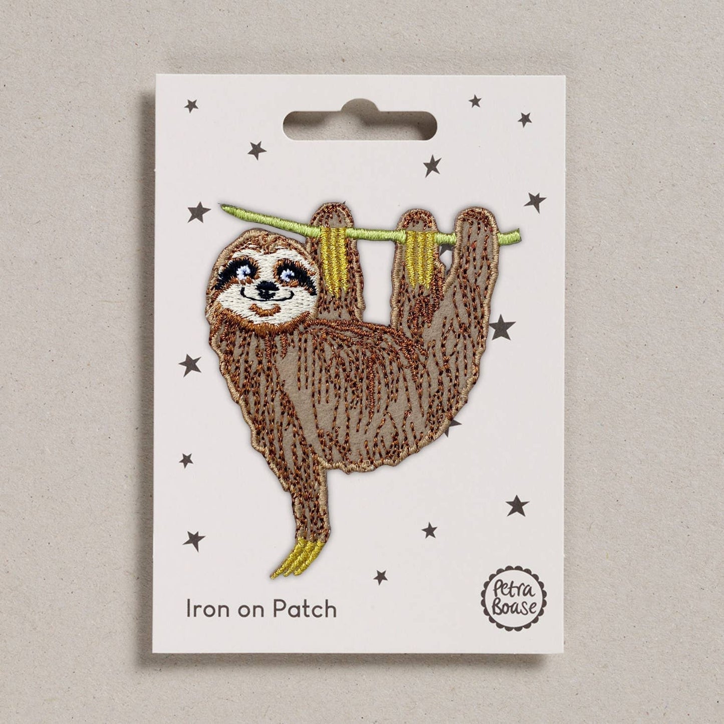 Embroided Sloth on cardboard