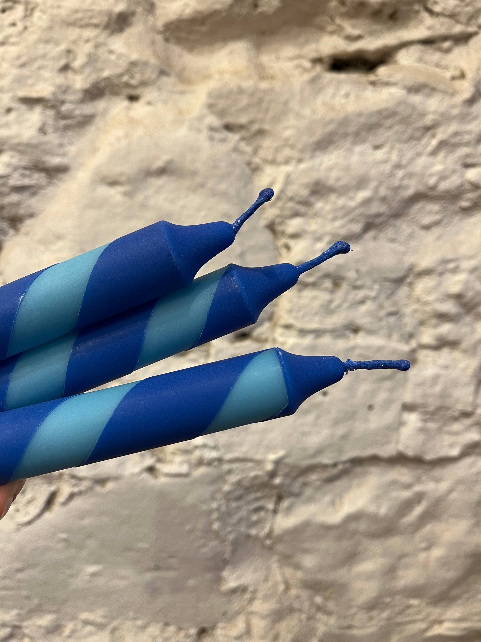 Aqua and royal blue spiral dinner candles.