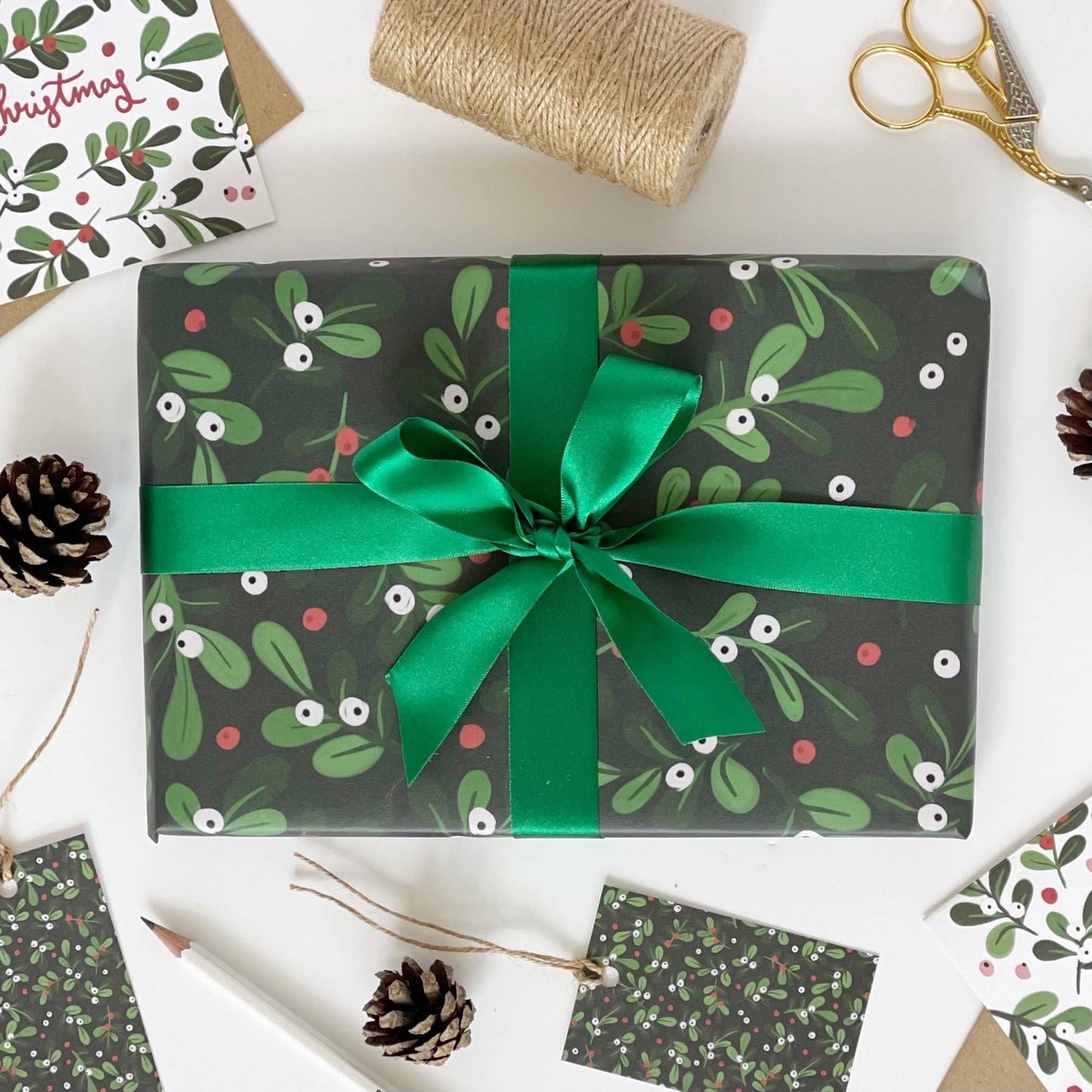 mistletoe wrapped gift 
