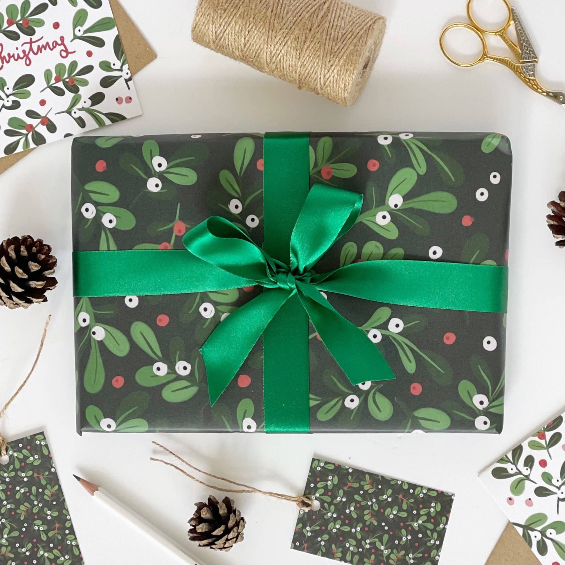 mistletoe wrapped gift 
