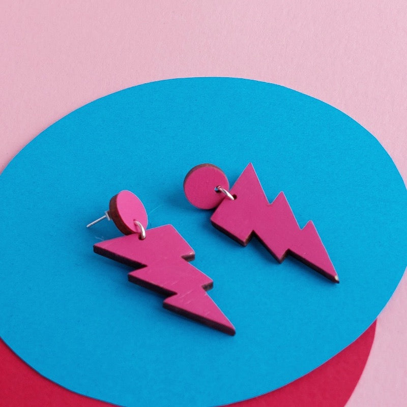 Pink lightning bolt dangly studs