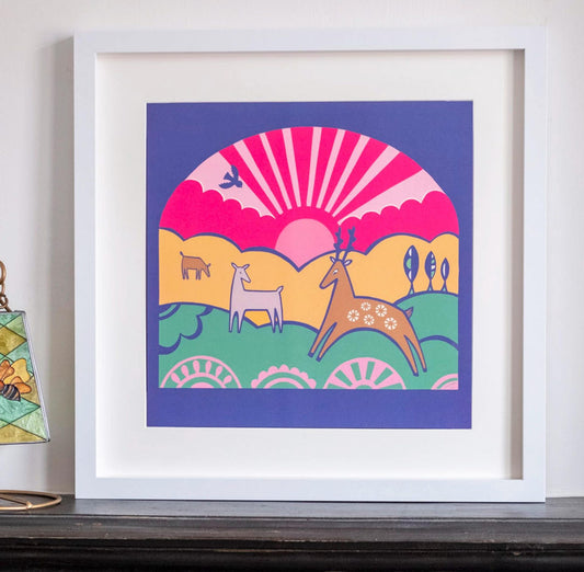 A colourful 2D illustration of art deco style deer with a pink sunset behind them.
