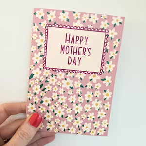 Happy Mothers Day Card scattered all over with little daisies.