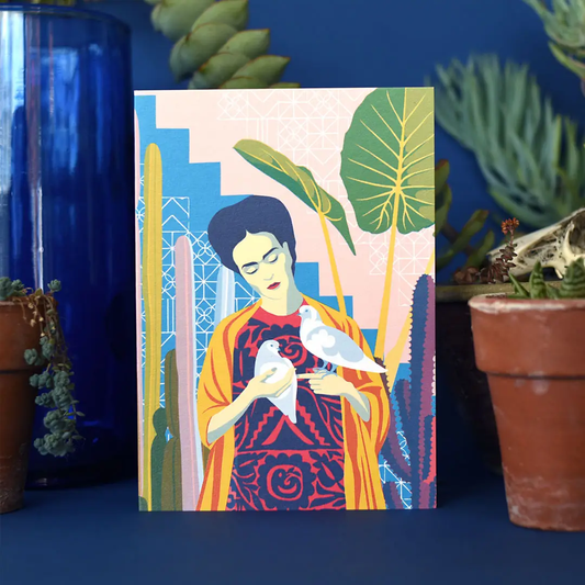 Frida Kahlo card holding 2 doves
