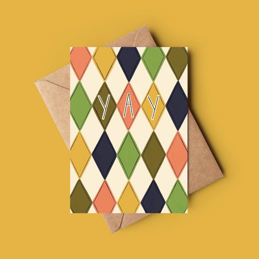 Colorful geometric patterned card with 'YAY' text on a yellow background