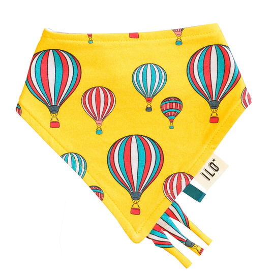 Balloons on yellow print organic cotton jersey fabric , made in the uK