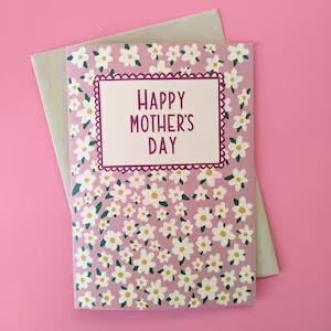 Happy Mothers Day Card scattered all over with little daisies.