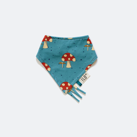 Toadstool on blue background fabric bib for baby