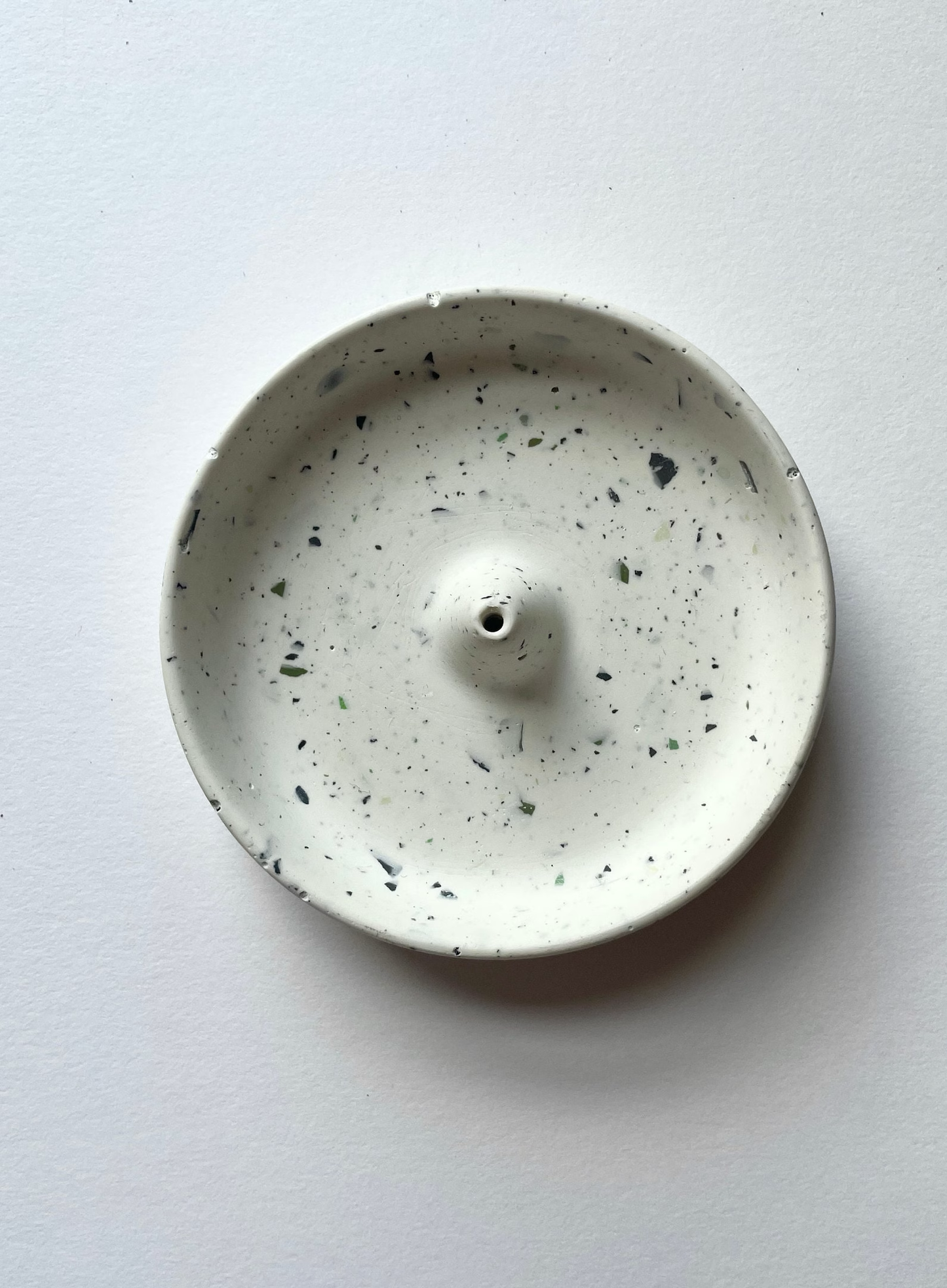 Round incense holder made from jesomite.