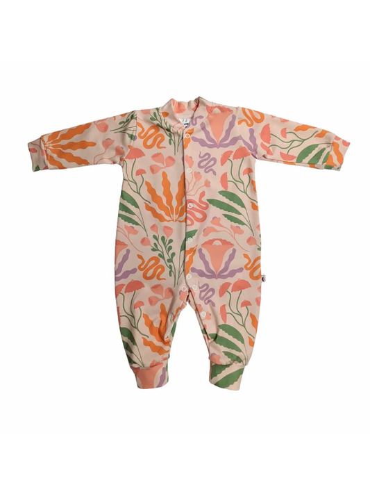 Lovely pastel print with serpentine, foliage and lightening bolts all over.  Long sleeved sleepsuit.