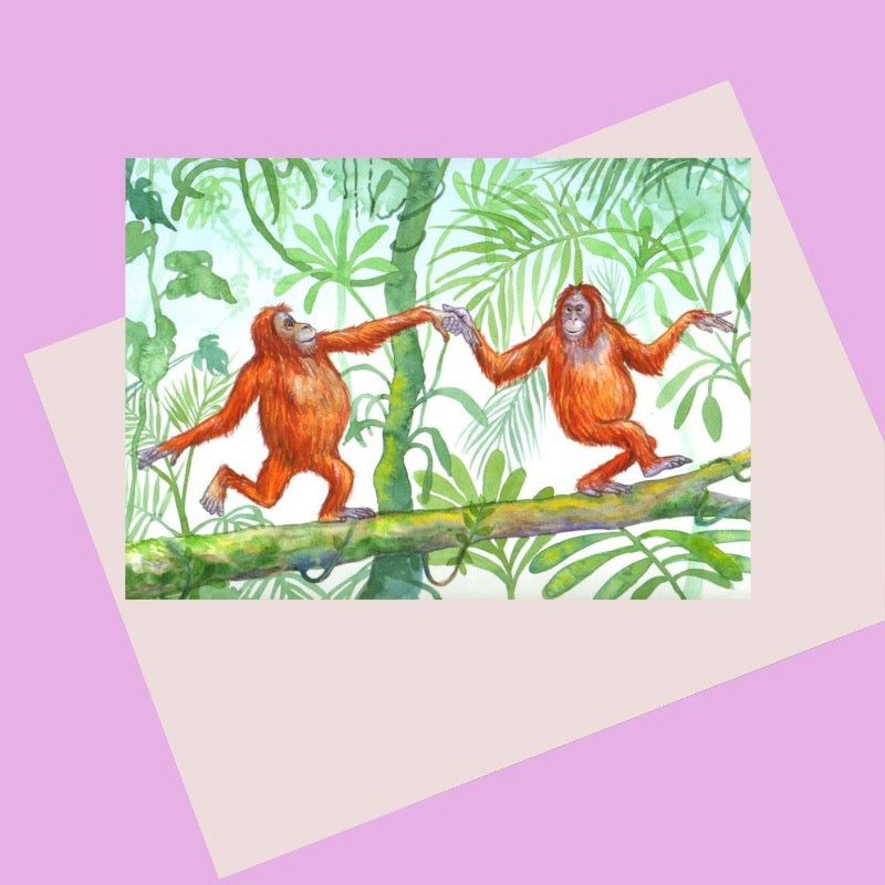 Card with illustration of two orangutans dancing on a branch