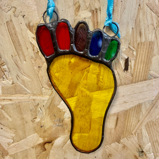 A colourful Glass Footprint Suncatcher