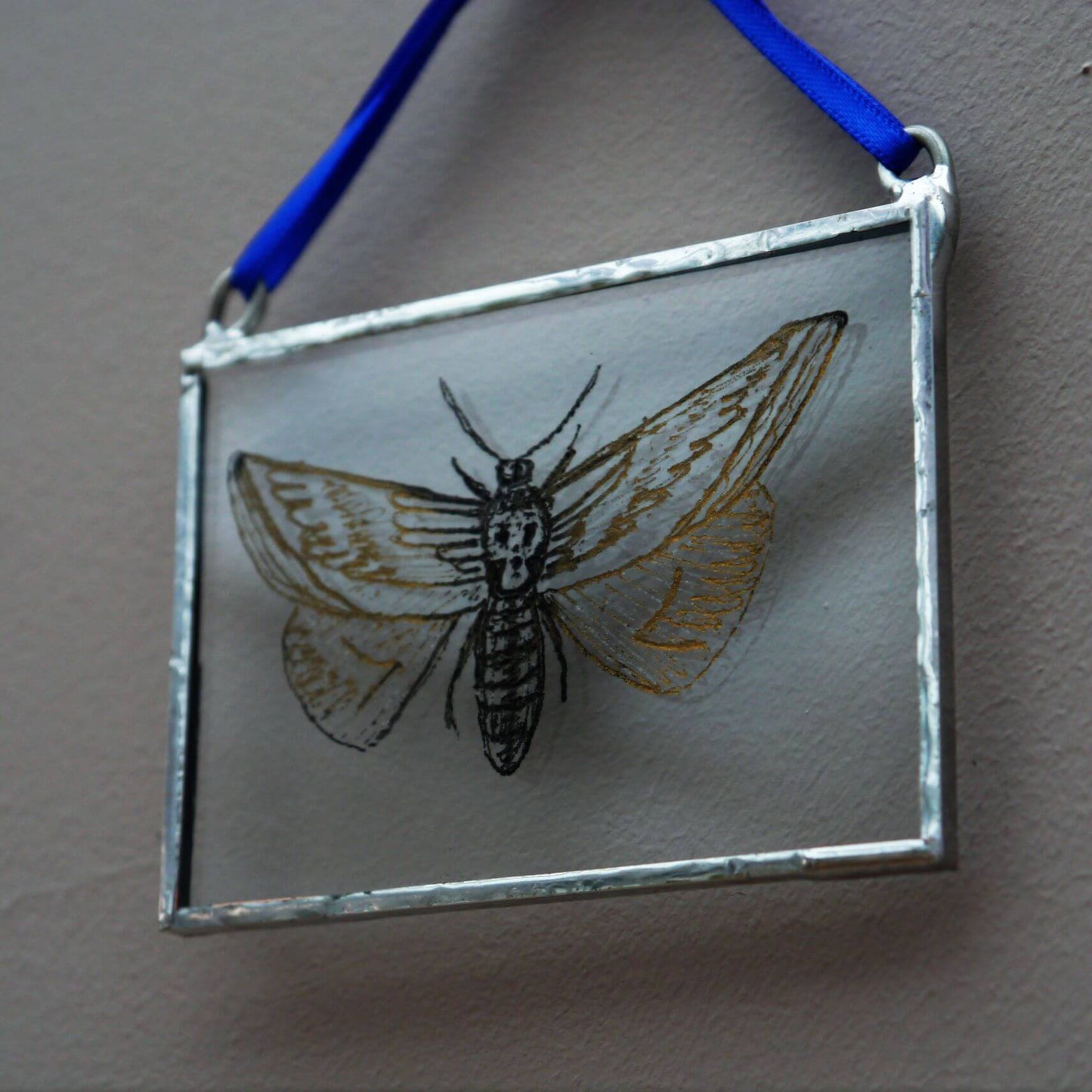 The Corbeau Press Moth With Skull Hanging