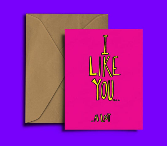 Glass Designs Dixon Does Doodles card with a pink background and yellow writing saying i like you a lot 