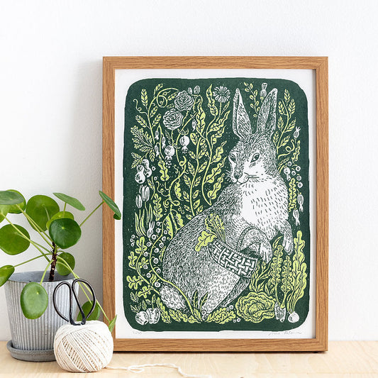 Hare relaxing in foliage